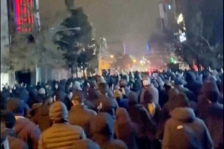 In this frame grab from footage circulating on social media from Iran protesters take to the streets of Tehran despite an intensifying crackdown as the Islamic Republic remains cut off from the rest of the world in Tehran, Iran, Saturday Jan. 10, 2026.