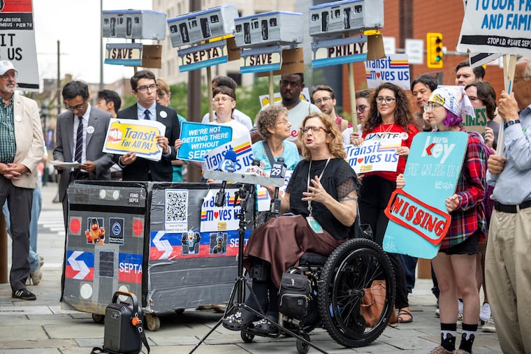 Julie Rea, an organizing fellow for Transit Forward Philadelphia and an accessibility advocate, talks about the need for more state transit funding Friday at a news conference near Independence Hall.