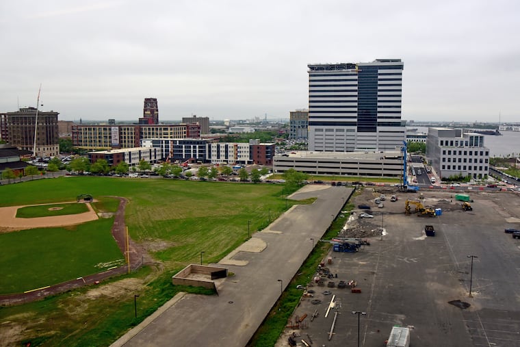A recent view of the Camden Waterfront from the Benjamin Franklin Bridge is dominated by the office tower that will be the corporate headquarters of Conner Strong & Buckelew, where South Jersey Democratic powerbroker George E. Norcross 3d is chairman.