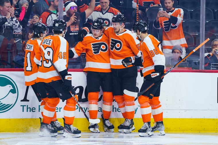 Owen Tippett (center) celebrates his goal in the second period against the Columbus Blue Jackets. He later added the game-winner in overtime.
