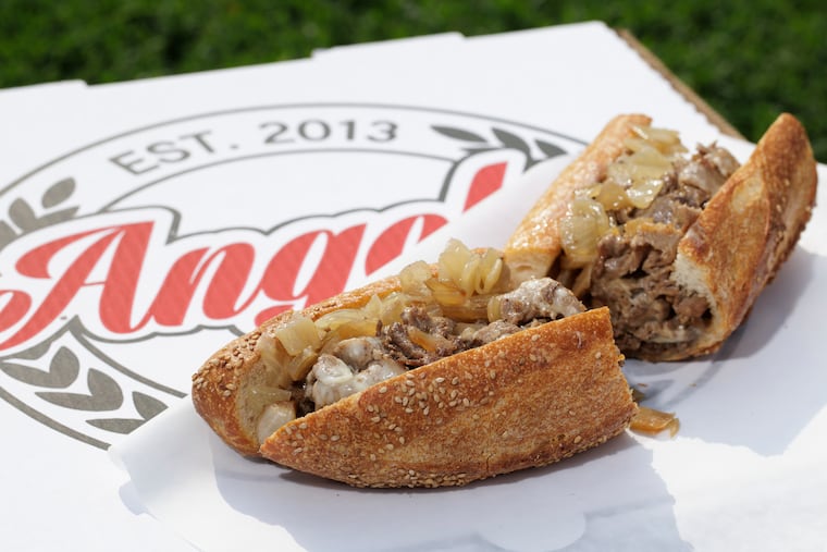 A cheesesteak with onions and Cooper Sharp American cheese near Angelo’s in Philadelphia on Thursday, Aug. 15, 2024. Food Styling by Emilie Fosnocht