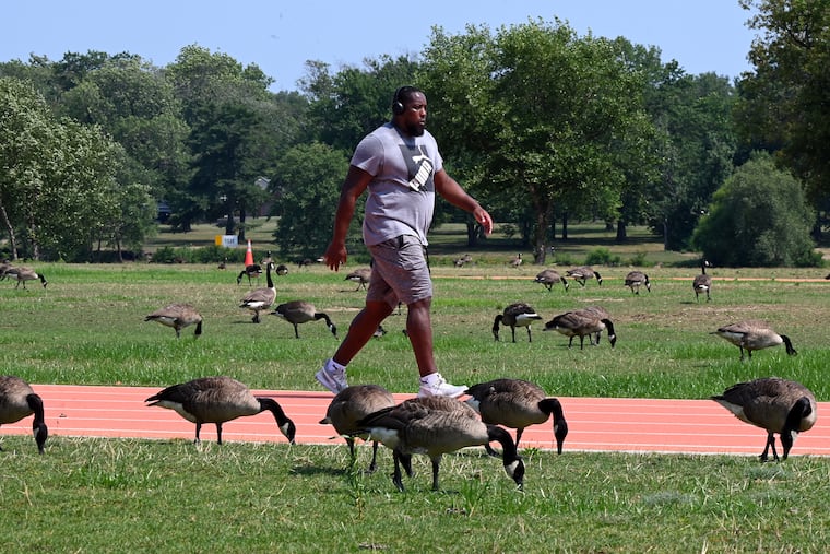 July 22, 2024: Some people dance with wolves, but Jere Neal is walking with birds, on the quarter-mile track along the Cooper River in Pennsauken, N.J. Neal did 10 laps (2-1/2 miles) in the mid-afternoon heat. He aims to exercise two or three times a week, year round