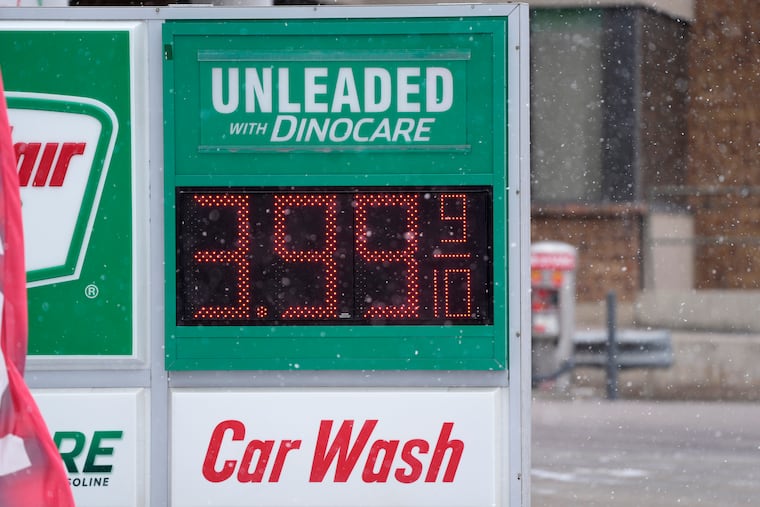 Price for a gallon of regular-grade gasoline is shown on a digital sign at a service station Wednesday in Denver.