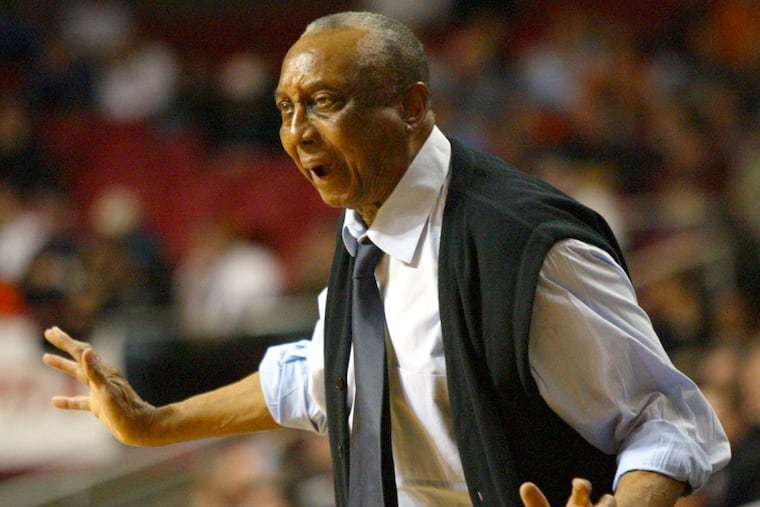 Temple Head Coach John Chaney yells to his team in the first half against Princeton, Monday, 12/20/2004. Temple beat Princeton 48-46. Chaney coached his 1000th game.
