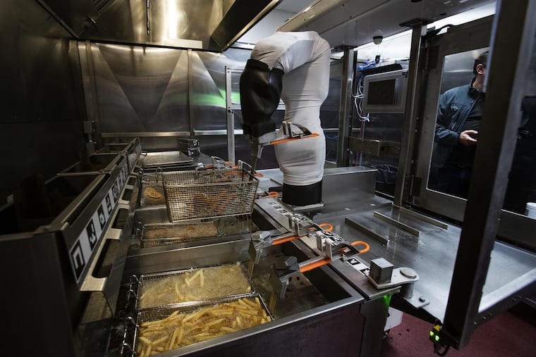Flippy the robot demonstrates its ability to man a fry station at Miso Robotics on January 28, 2020 in Pasadena, California. (Gina Ferazzi/Los AngelesTimes/TNS)