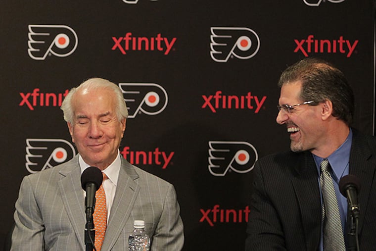 Flyers chairman Ed Snider (left) and general manager Ron Hextall (right). (David Maialetti/Staff file photo)