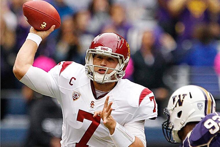 NFL Network draft analyst Mike Mayock set the tone when he complained over the inconsistency of this year's quarterback class. (Elaine Thompson/AP file photo)