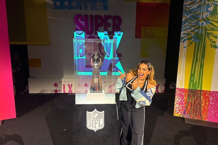 Northeast Philadelphia's Delilah Dee poses with the Superbowl LX trophy at Moscone Center at San Francisco's Moscone Center, on Feb. 7 2026