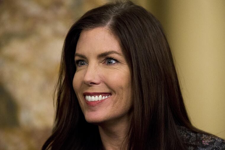 Pennsylvania Attorney General Kathleen Kane looks on before newly elected members of the Pennsylvania Legislature are sworn in, Tuesday, Jan. 6, 2015, at the state Capitol in Harrisburg, Pa. (AP Photo/Matt Rourke)