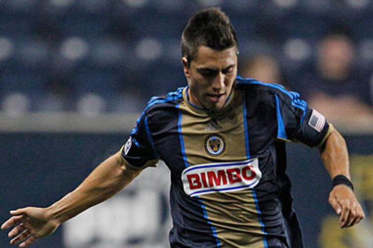 The Union's Michael Farfan gets the job done no matter where is positioned on the pitch. (Ron Cortes/Staff Photographer)
