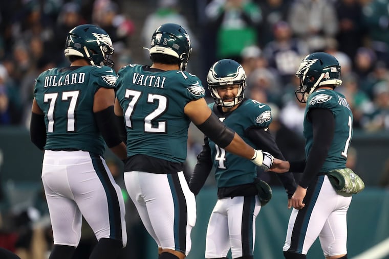 Eagles kicker Jake Elliott (second from right) celebrates after making a field goal against New England on Nov. 17, 2019.
