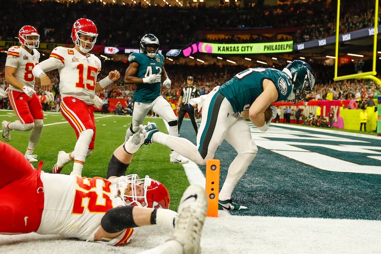 Eagles cornerback Cooper DeJean scoring a touchdown on an interception return during Super Bowl LIX against the Chiefs.