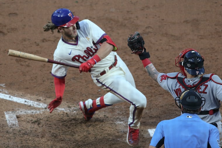 Phillies rookie Alec Bohm ducks an inside pitch from Red Sox pitcher Matt Barnes during the seventh inning of the first game of Tuesday's doubleheader.