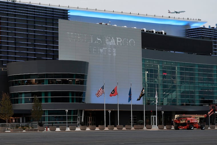 The Wells Fargo Center logo on the west-facing side of the building was removed on Thursday.