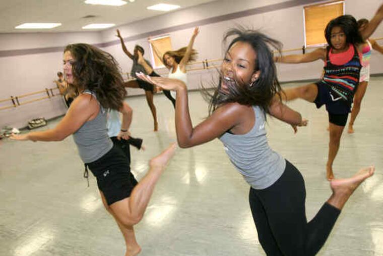 Dancers in "Standing Ovation" include Jeana Zettler (left) of Richboro and Erika Corvette of Sicklerville. Coach Sal Dupree tells students that "if we work together, then maybe I can get you a little bit of that dream you're talking about."