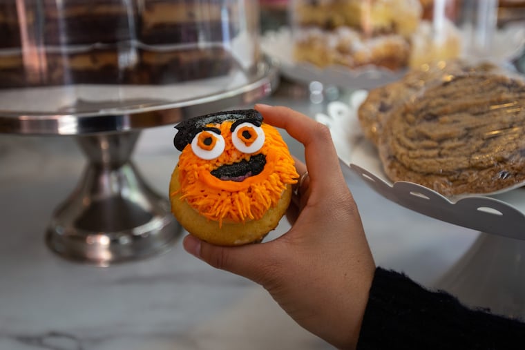 A vanilla cupcake topped with Gritty frosting.