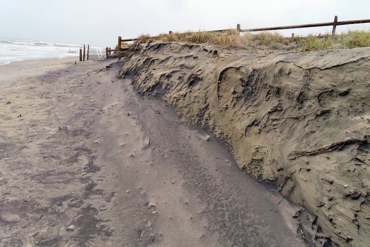 Significant erosion is visible at a beach in Strathmere, N.J., in May 2022. More recent erosion lead to the demolition of the town's lifeguard headquarters house.