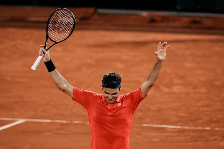 Switzerland's Roger Federer celebrates after defeating Germany's Dominik Koepfer in their third round match on day 7, of the French Open tennis tournament at Roland Garros in Paris, France, Saturday, June 5, 2021.