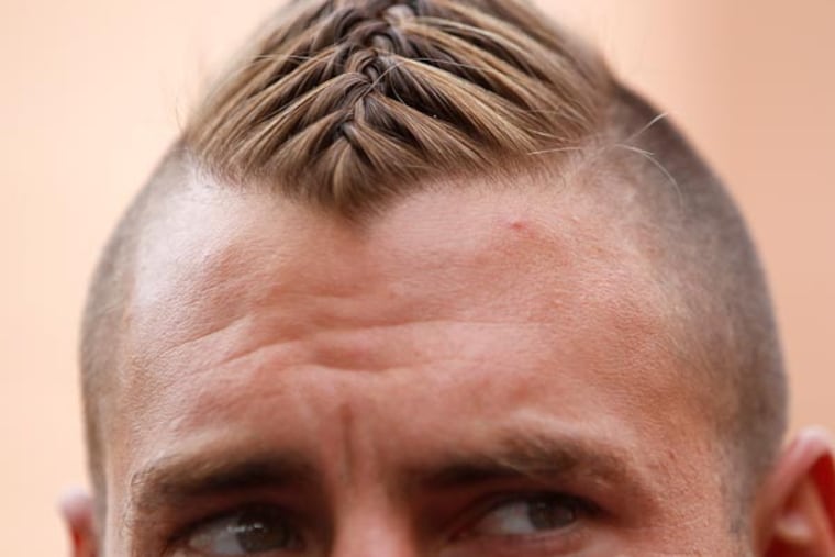 Todd Herremans sporting a new haircut that he described as Viking-like. (David Maialetti/Staff Photographer)