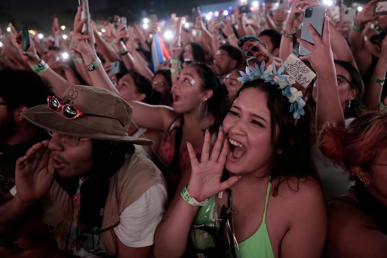 Kimberly Sanchez of Rancho Cucamongo, California cheers as Bad Bunny performs on the Rocky Stage during the Made in America 2022 festival on the Ben Franklin Parkway in Phila., Pa. on Sept. 4, 2022.