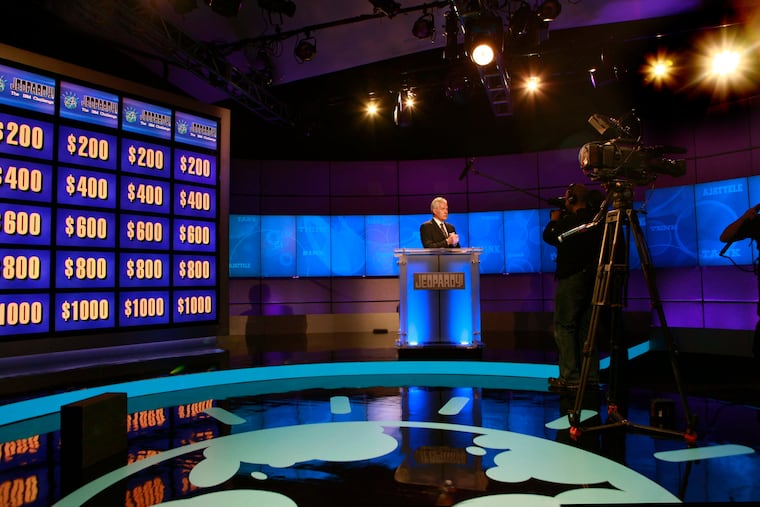 The host of "Jeopardy!", Alex Trebek, rehearses for an upcoming January 2011 show featuring a trivia showdown against an IBM computer in Yorktown Heights, N.Y. Trebek died Sunday, Nov. 8, 2020; he was 80. (Carolyn Cole/Los Angeles Times/TNS)