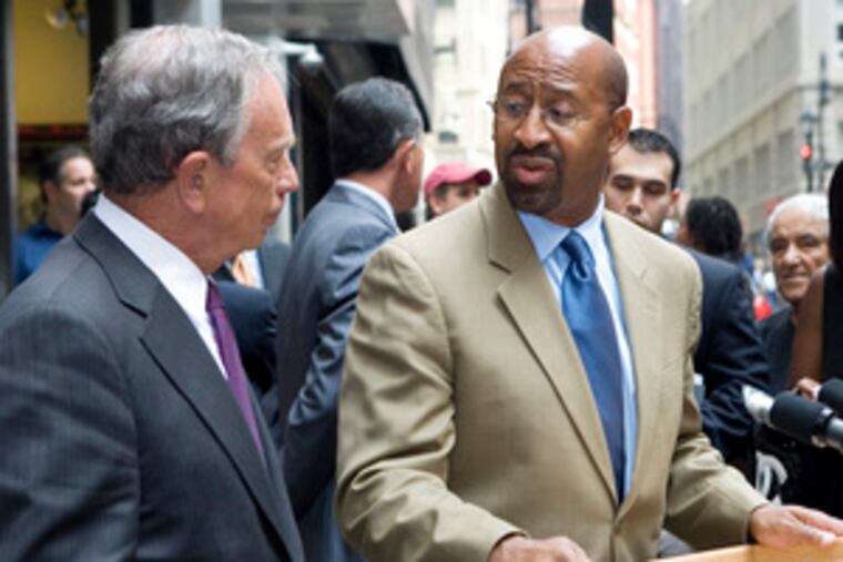 In New York City (top left photo), Philadelphia mayoral candidate Michael Nutter got governing tips, toured city facilities and held a news conference with New York Mayor Michael Bloomberg (above, left), after having a chat with the mayor at a lower Manhattan diner (below) yesterday.
