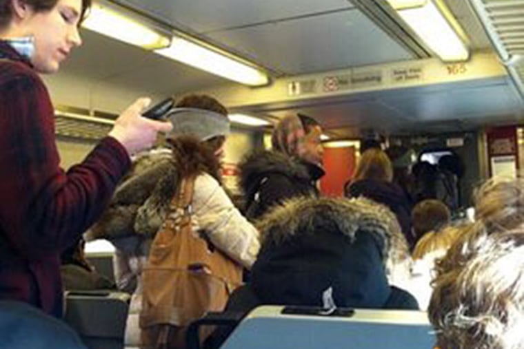 It was SRO on an inbound Doylestown train this morning. (Jennifer Lin/Staff)