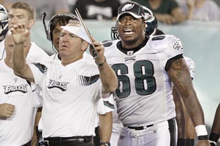 The Eagles' Anthony Hargrove (right) has been clean since a second positive drug test in 2008. (Elizabeth Robertson/Staff Photographer)