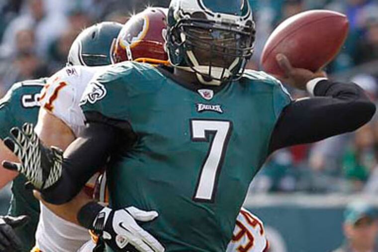 "I don't think our season was decided based on the interceptions that I threw," Michael Vick said. (Ron Cortes/Staff Photographer)