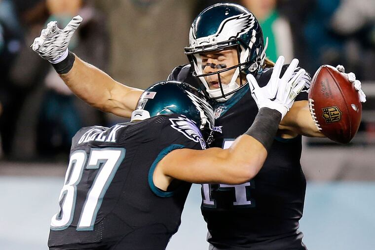 Riley Cooper celebrates his first-quarter touchdown with teammate Brent Celek.