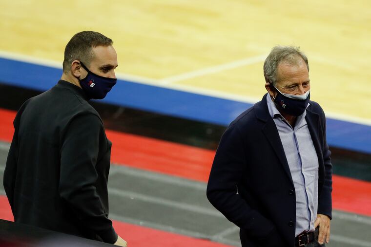 Michael Rubin (left) with fellow investment tycoon and Sixers owner Josh Harris of Apollo Global Management at a Sixers-Nets game in February.