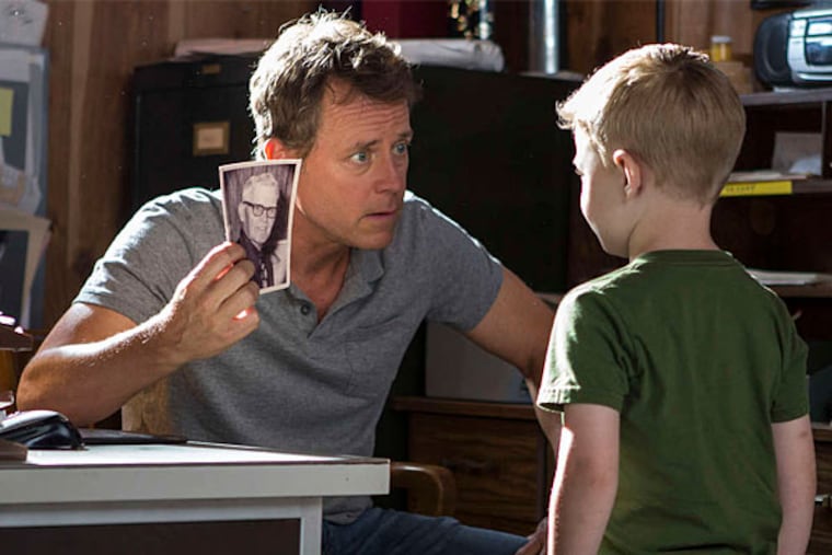 Greg Kinnear with Connor Corum in "Heaven Is for Real," about a Nebraska preacher whose young son maintains that he has been to heaven. (Sony Pictures)
