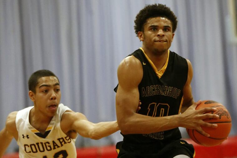 Archbishop Wood’s Tyree Pickron (10) drives past Martin Luther King’s Mikey Robinson in the PIAA District 12 Class 5A final last season. LOU RABITO / Staff