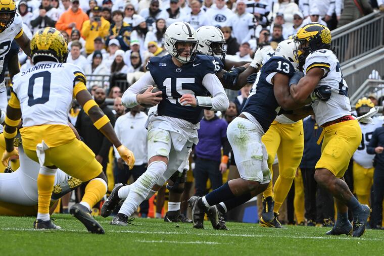 Penn State quarterback Drew Allar runs for a touchdown against Michigan on Saturday.
