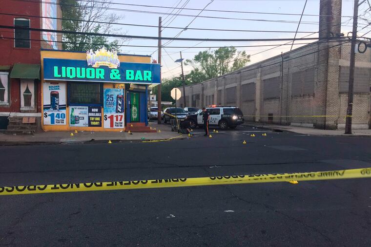 This photo provided by CBS3 Philadelphia shows police canvasing the scene of the shooting that left 10 people wounded early Saturday in Trenton.