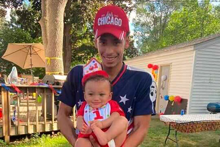 Daunte Wright and his son, Daunte Jr., at his first birthday party. Wright, 20, was killed during a traffic stop by a white suburban Minneapolis police officer on Sunday.