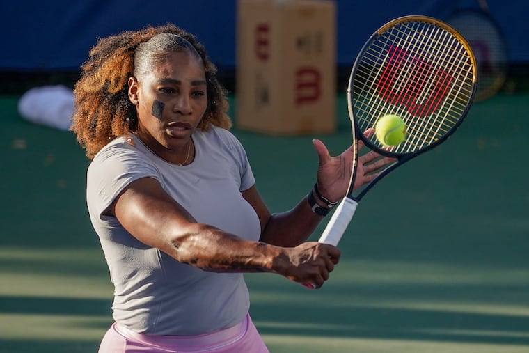 Serena Williams, of the United States, practices before playing against Anett Kontaveit, of Estonia, during the second round of the U.S. Open tennis championships.