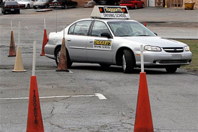 Some new technology and old-fashioned advice may help steer you in the right direction when you're teaching one of your kids to drive. (Gene Blythe / AP Photo / File)