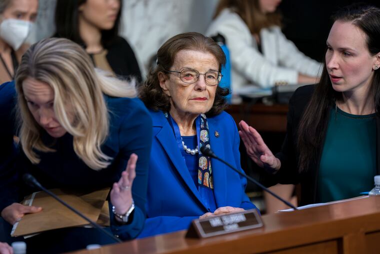 U.S. Sen. Dianne Feinstein, D-Calif., is flanked by aides as she returns to the Senate Judiciary Committee following a more than two-month absence as she was being treated for a case of shingles, at the Capitol in Washington, Thursday, May 11, 2023. Feinstein’s office said Thursday, May 18, that she is suffering from Ramsay Hunt syndrome, a complication from the shingles virus that can paralyze part of the face, and that she contracted encephalitis while recovering from the virus earlier this year.