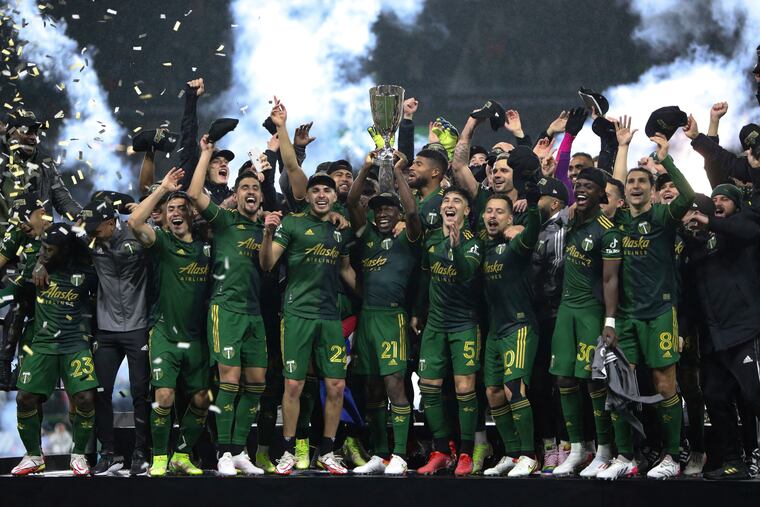 Portland Timbers players celebrate after winning the Western Conference final.