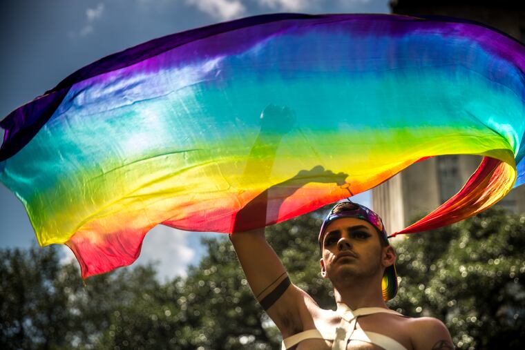Austin Muckelroy (he/him) celebrates at Houston Pride Parade on June 23, 2018.