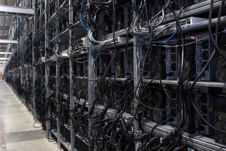 Bitcoin mining machines in a Rockdale, Texas, warehouse in 2021.
