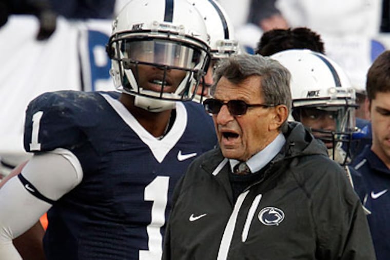 Joe Paterno will have four quarterbacks to choose from at the start of the season. (Gene J. Puskar/AP file photo)