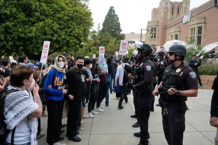 Pro-Palestinian demonstrators and police face off on the UCLA campus in May 2024.