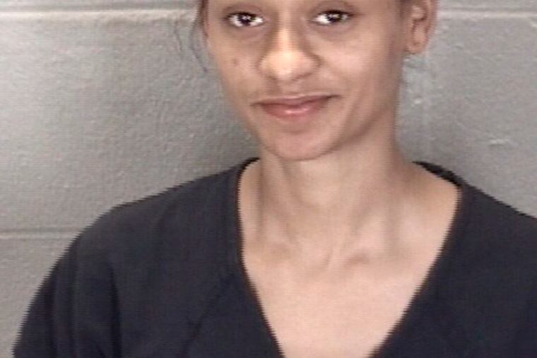 This undated booking photo released by Tippercanoe County Sheriff's Office shows Kiana Champagne Fletcher. (Tippercanoe County Sheriff's Office via AP)