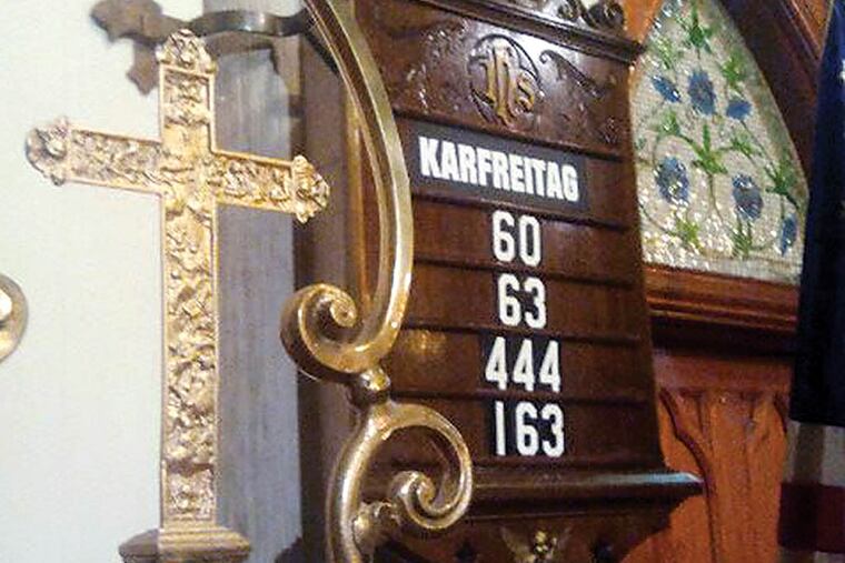 Hymn numbers posted at Old Zion Lutheran Church for Karfreitag. (That’s Good Friday in German.) CREDIT: J.P. MEYER