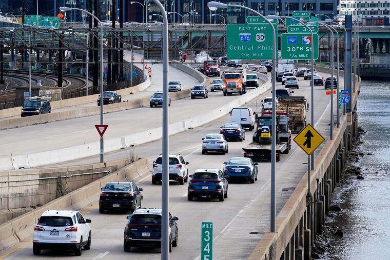 Morning traffic moves along Interstate 76 in Philadelphia, Monday, March 29, 2021.