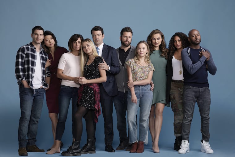 ABC's "A Million Little Things" cast (from left): David Giuntoli, Grace Park, Stephanie Szostak, Lizzy Greene, Ron Livingston, James Roday. Allison Miller, Christina Ochoa, Christina Moses, and Romany Malco