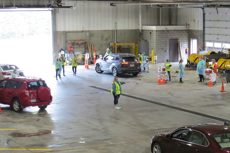 This 2020 photo provided by Carlton County shows its drive-thru flu clinic in Carlton, Minn. The facility is a way to social distance in the coronavirus pandemic, but also served as a test run for the COVID-19 vaccines that county health officials still know little about.