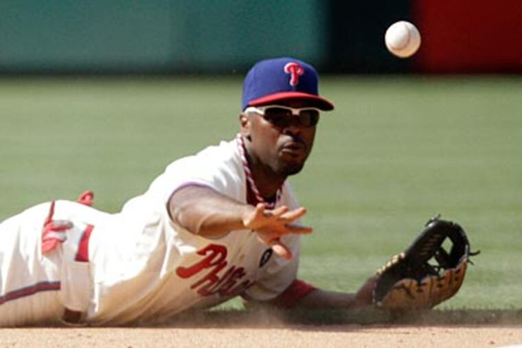 The Phillies would likely miss Jimmy Rollins' defensive skills if they let him walk after the season. (David Maialetti/Staff Photographer)